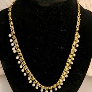 Costume jewelry necklace gold with small heart and hanging pearls